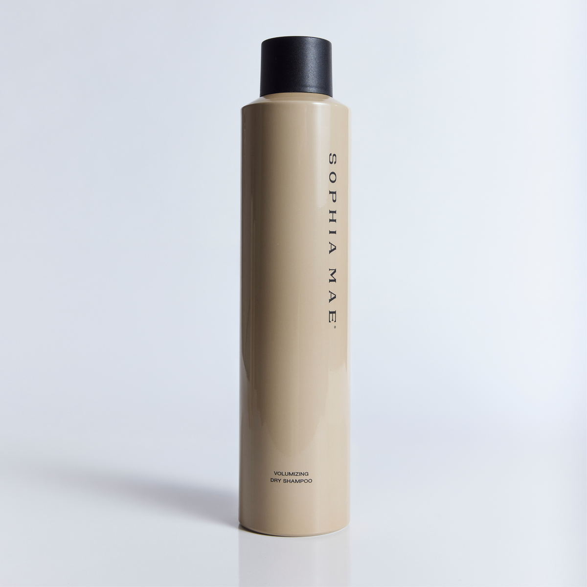 SOPHIA MAE Volumizing Dry Shampoo in beige packaging with a black cap.