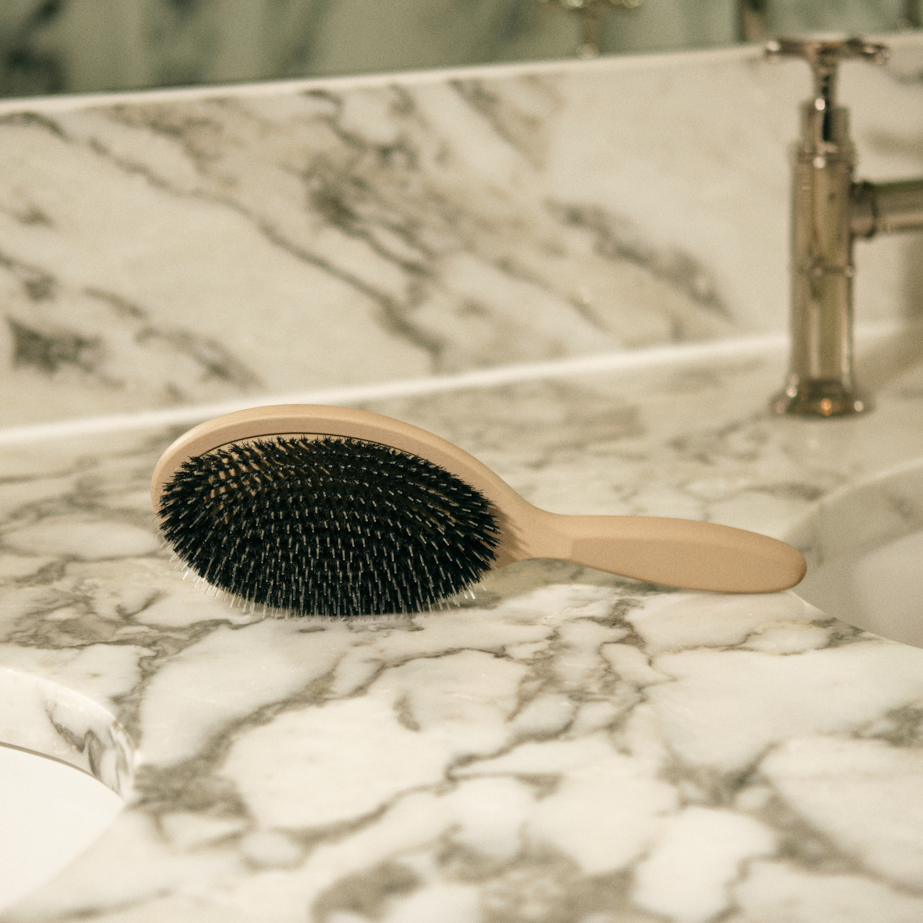 Large boar bristle brush with luxurious hair brush pouch.