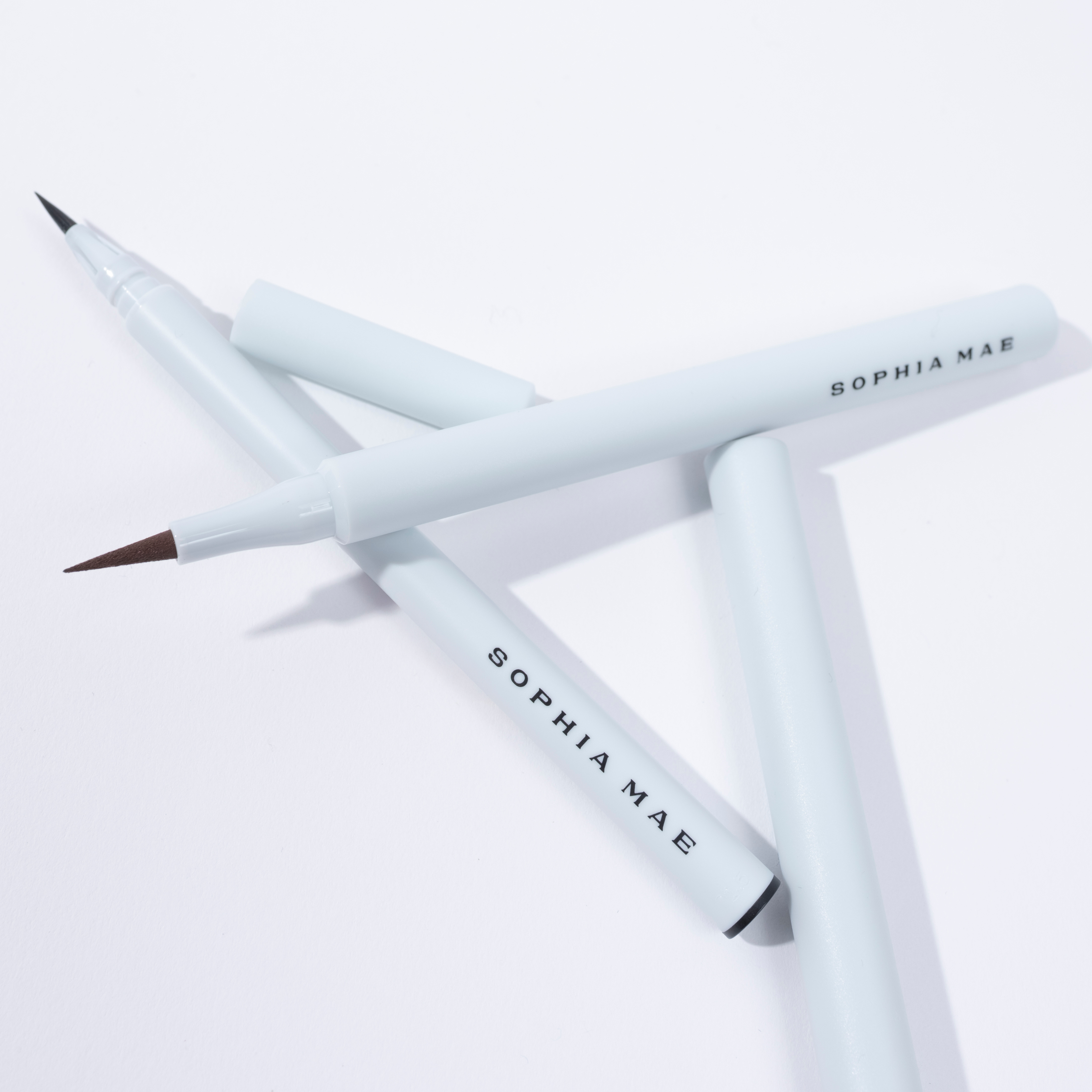 Liquid eyeliner with brush tip.