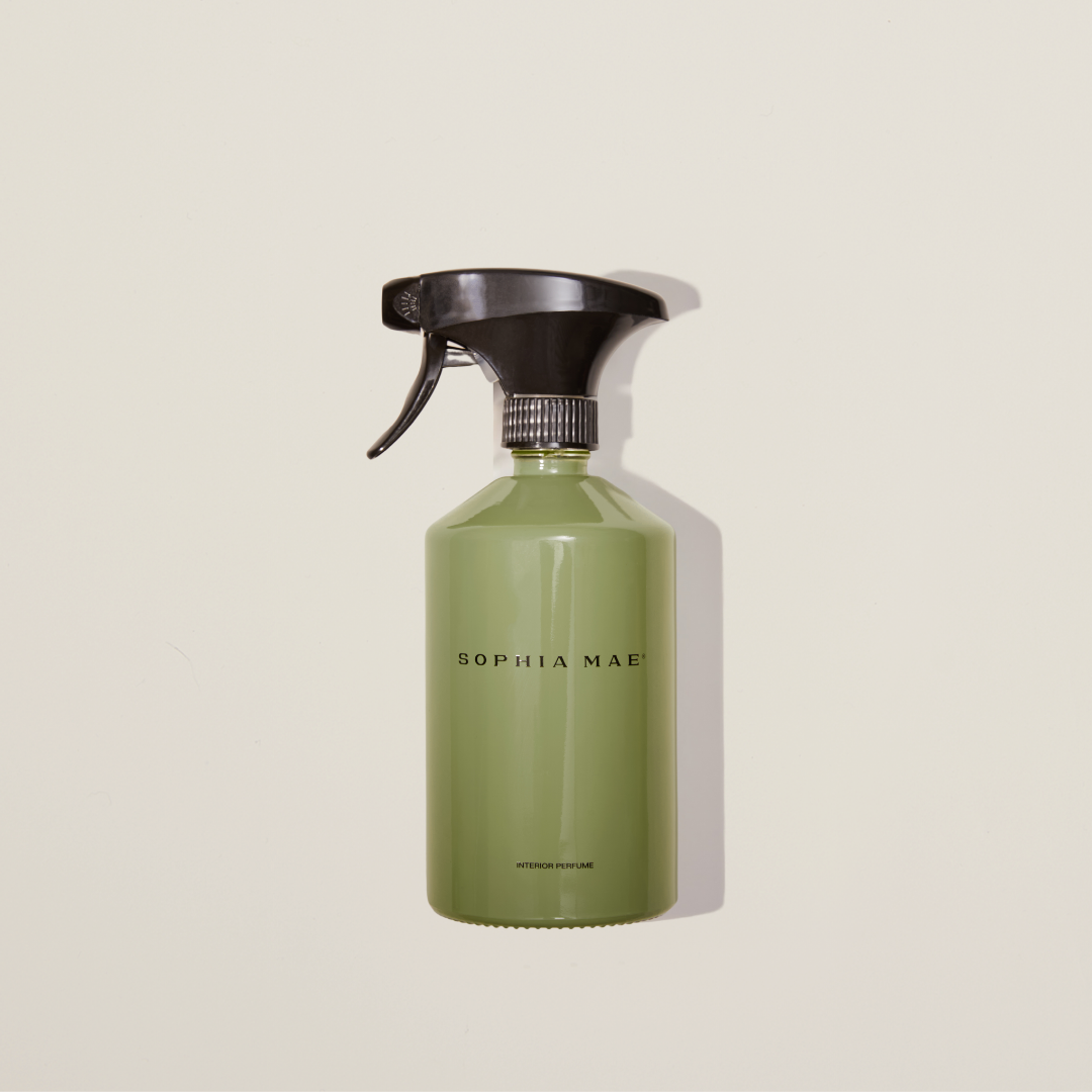 Artemis interior perfume spray in elegant glass bottle – a vibrant blend of orange blossom, basil, and bergamot for a refreshing and uplifting home ambiance.