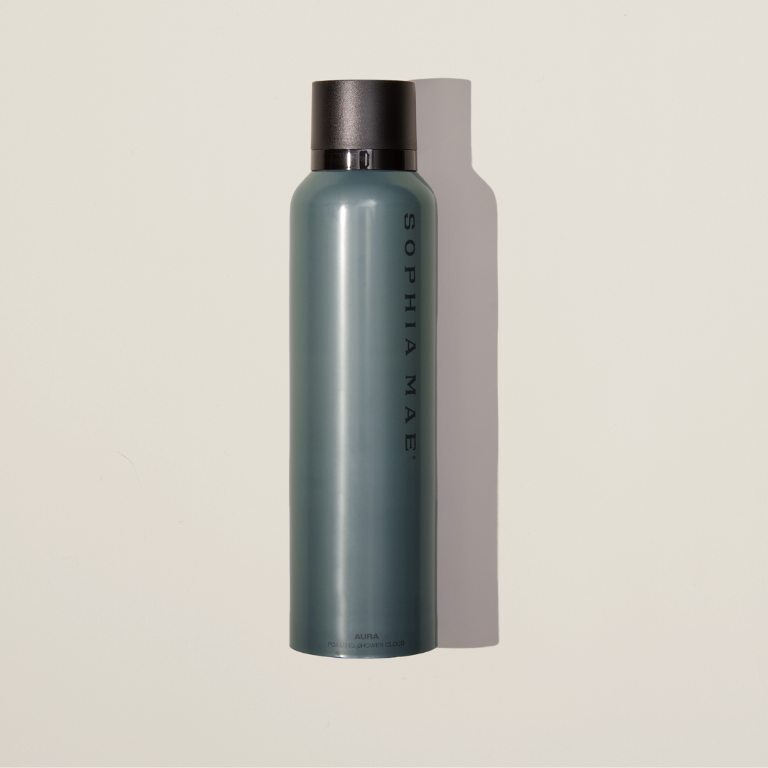 Matte bottle Aura shower foam – rich, velvety lather with a soft floral-spicy scent that revitalizes your aura with every use.