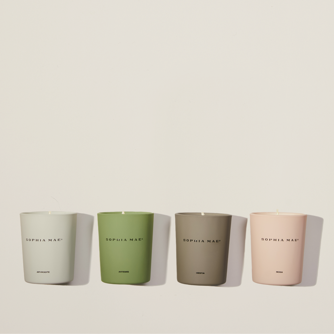 Luxury candle discovery set with four mini scented candles – explore floral, woody, and comforting aromas to match every mood and moment.