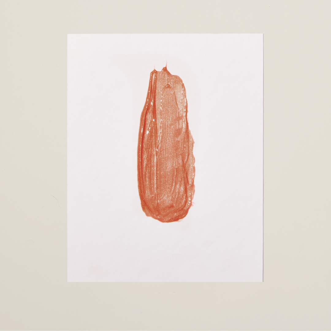 Bare Bliss shade – warm nude plumping lip gloss for a natural, fuller-looking lip with a smooth, glossy finish.
