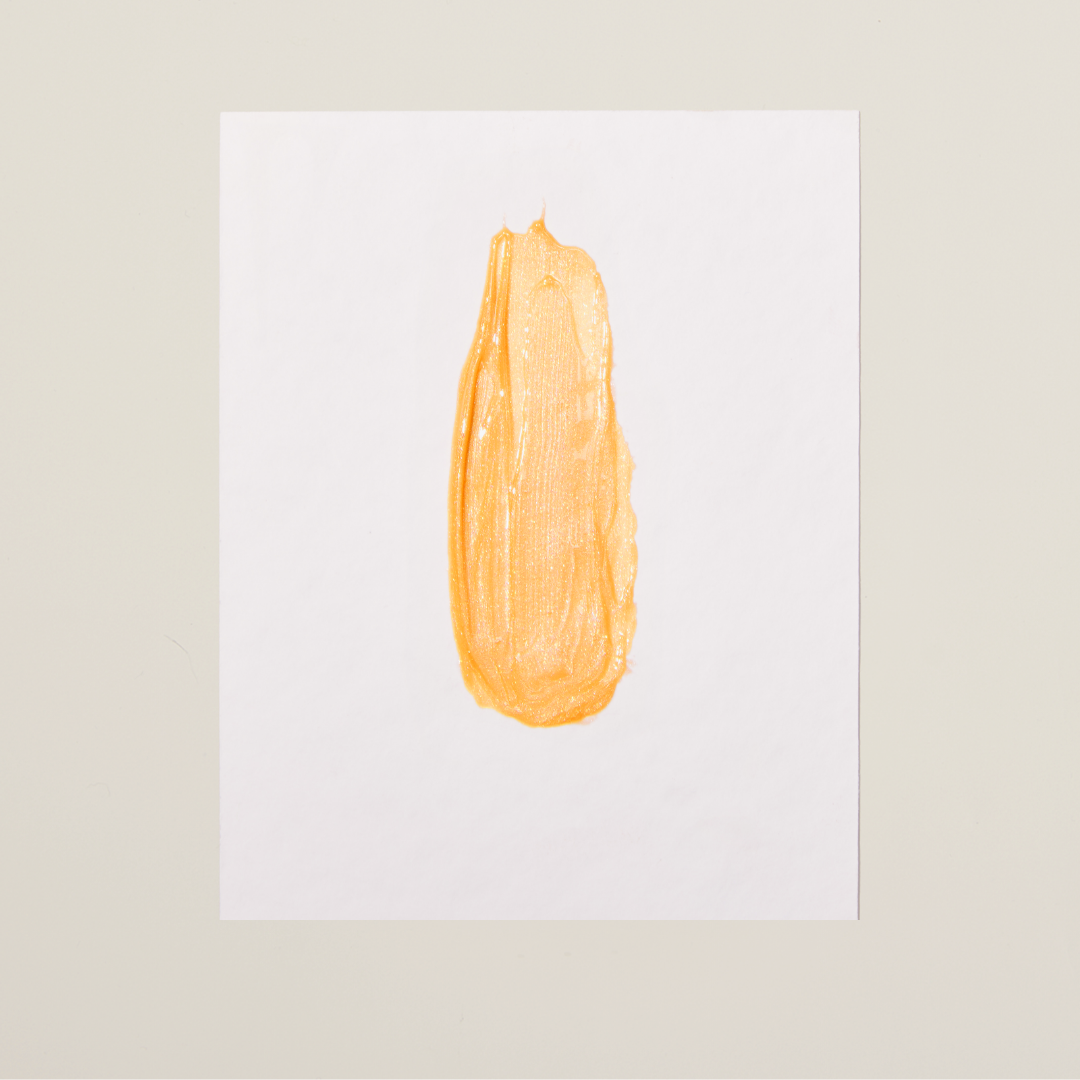 Golden Harmony shade – shimmering evening lip gloss with hydrating formula and luminous 3D finish.