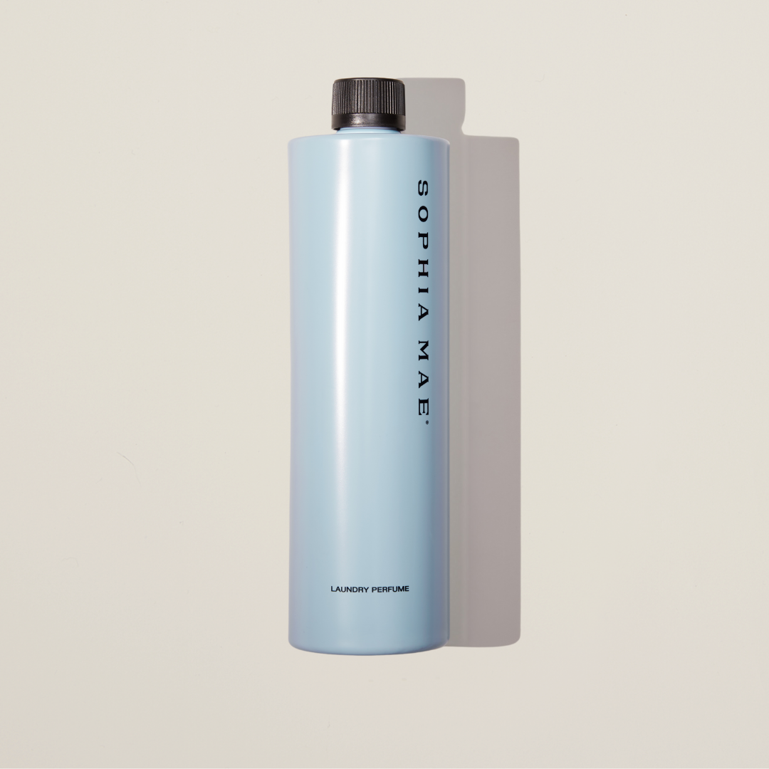 Midnight Melody laundry perfume – fresh and airy scent with citrus, coconut, vanilla, and musk for soft, elegantly scented laundry.