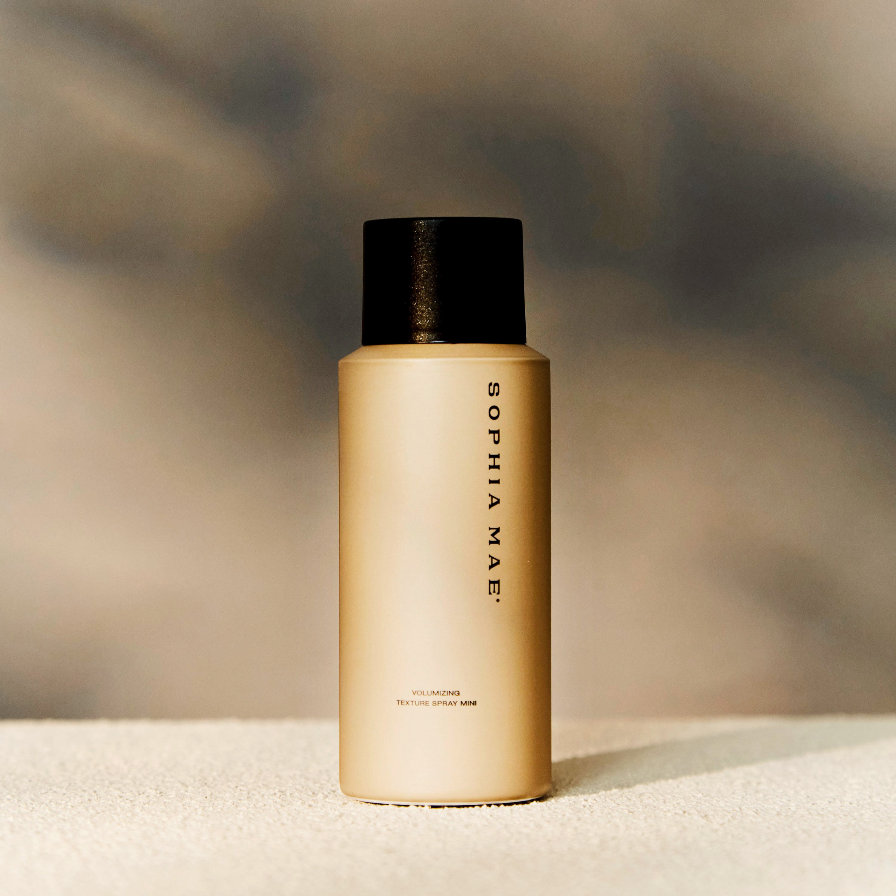 Mini hair spray for texturized hair.