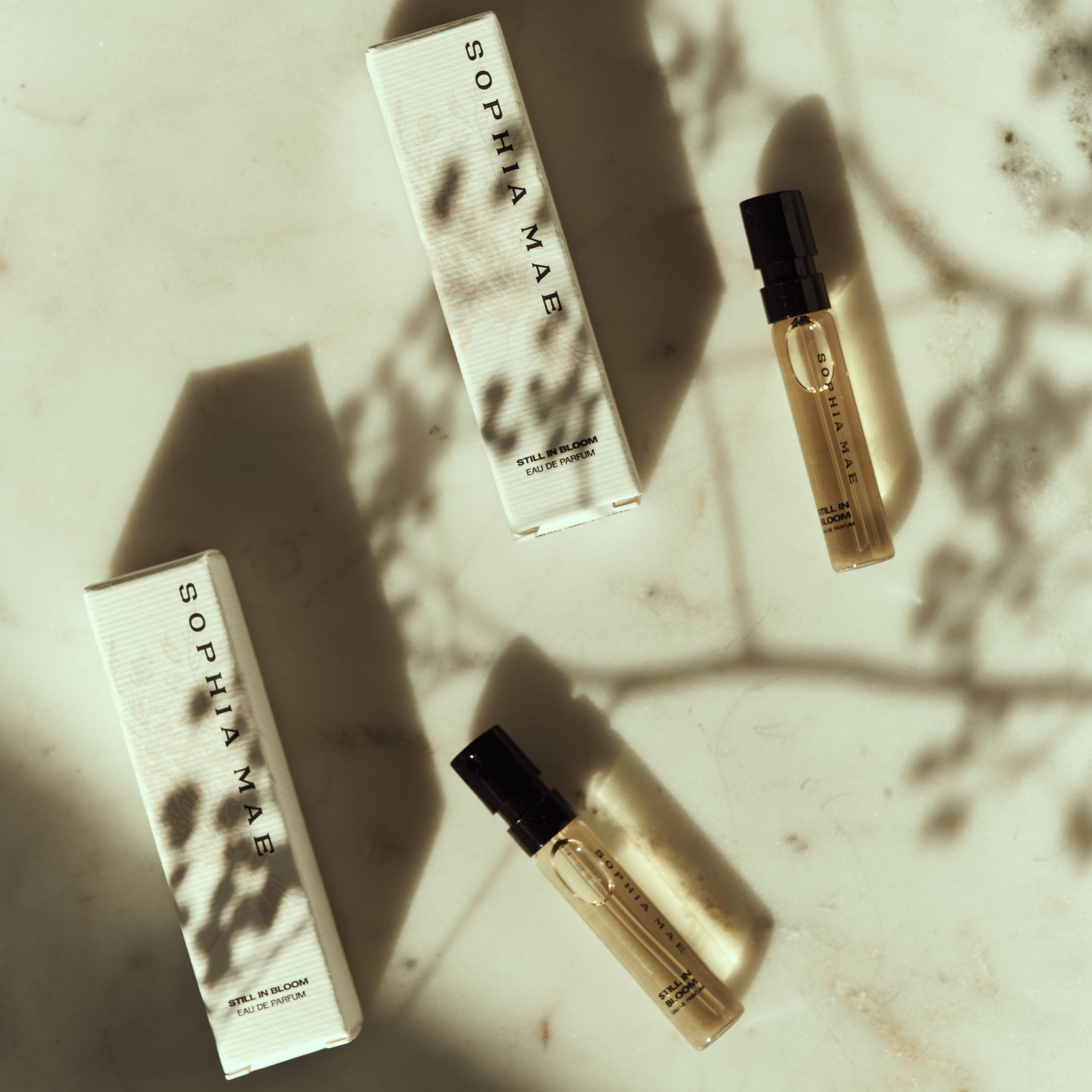 SOPHIA MAE perfume sample Still in Bloom, a floral perfume with pink pepper, amber, and musk.