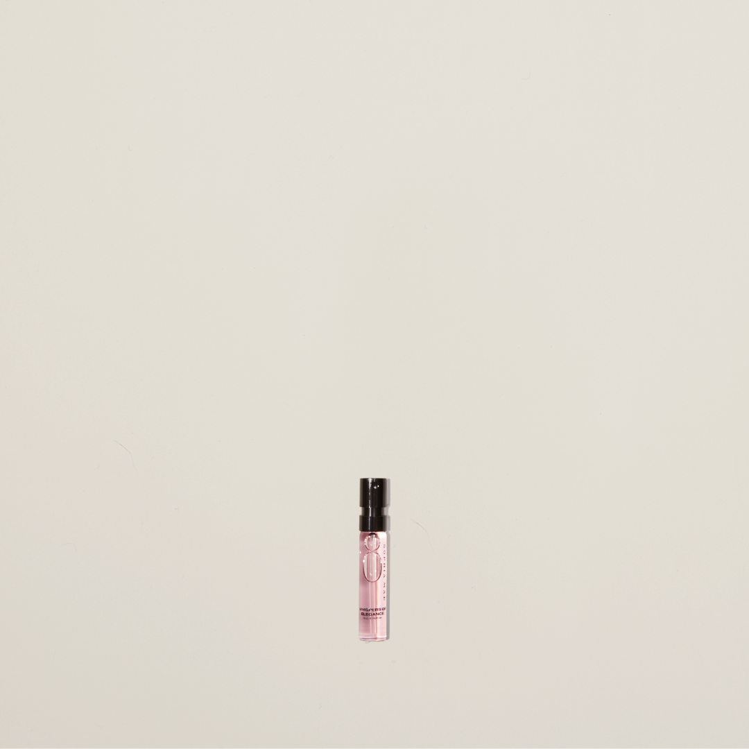 Whispers of Elegance eau de parfum sample – a chic powdery scent with cedarwood, caramel, vanilla, and saffron.