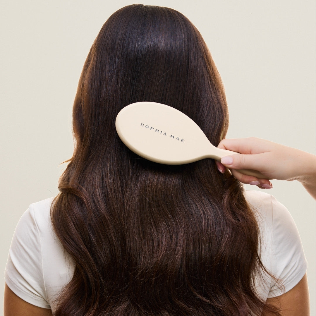 SOPHIA MAE boar bristle brush for natural shine and healthy hair, comes with a travel pouch.