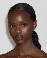 Model wearing SOPHIA MAE Deep Espresso Lip Liner, defining the lips with a deep brown tone for a natural sculpted finish.