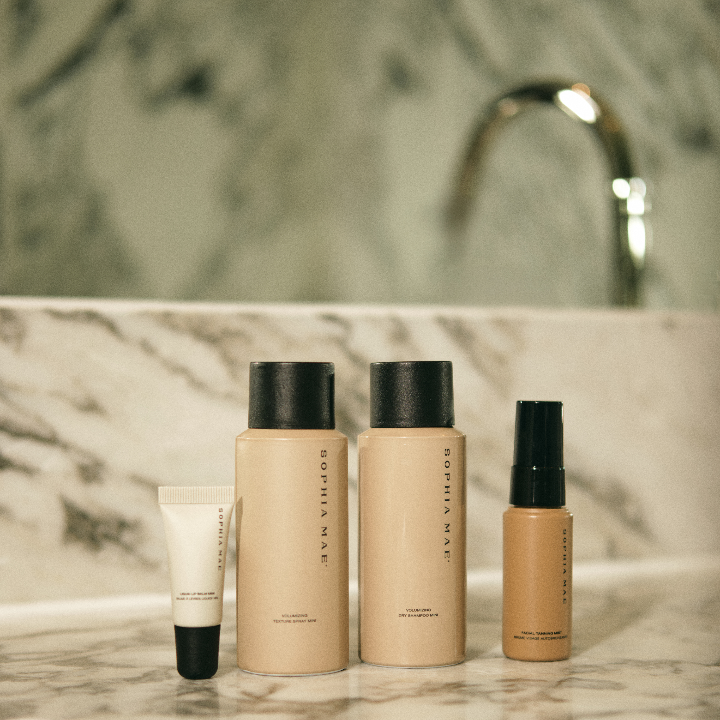 Facial Tanning Mist travel size, Majestic Mist mini, Majestic Texture mini and Liquid Lip Balm mini by SOPHIA MAE.