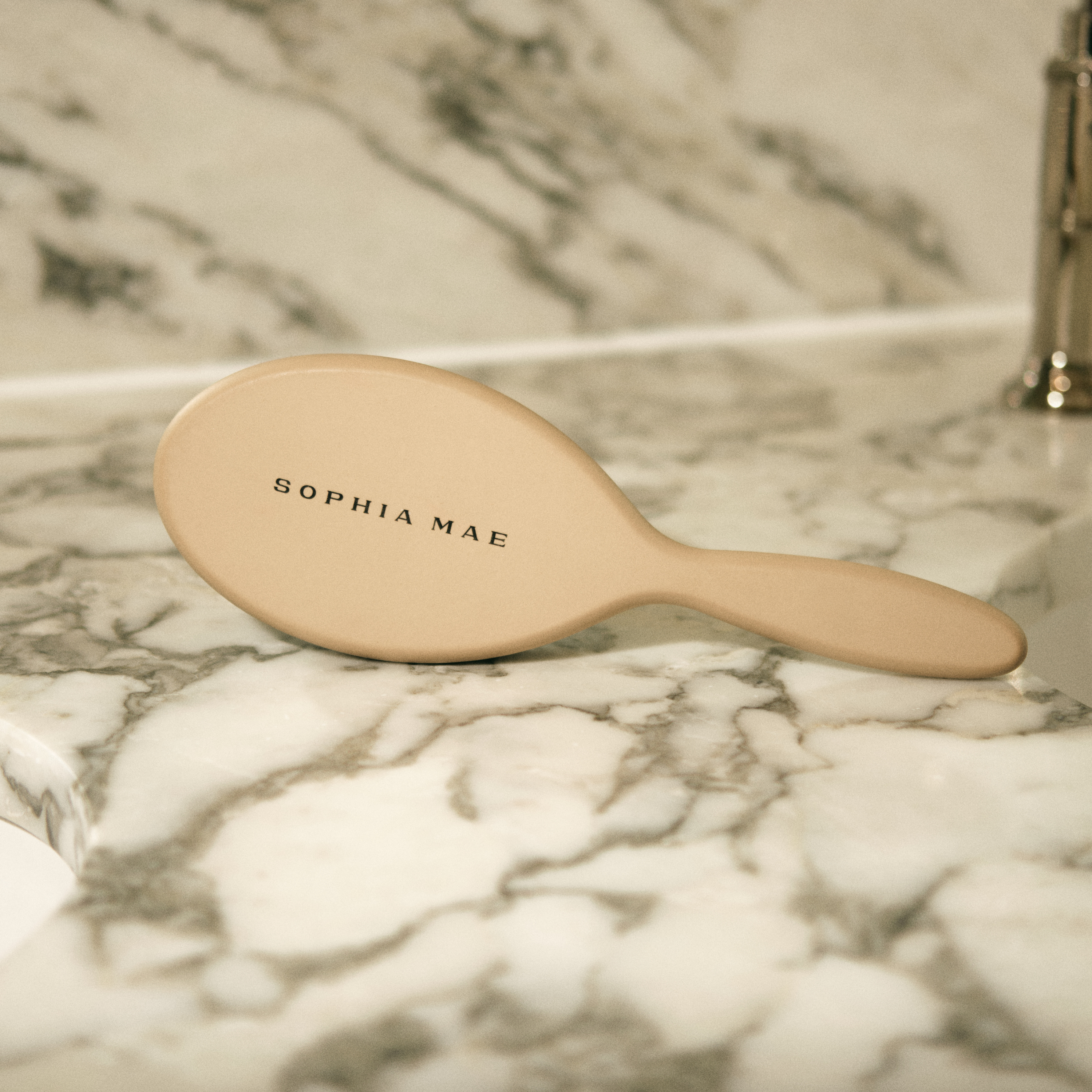 Large hairbrush that stimulates growth from SOPHIA MAE.