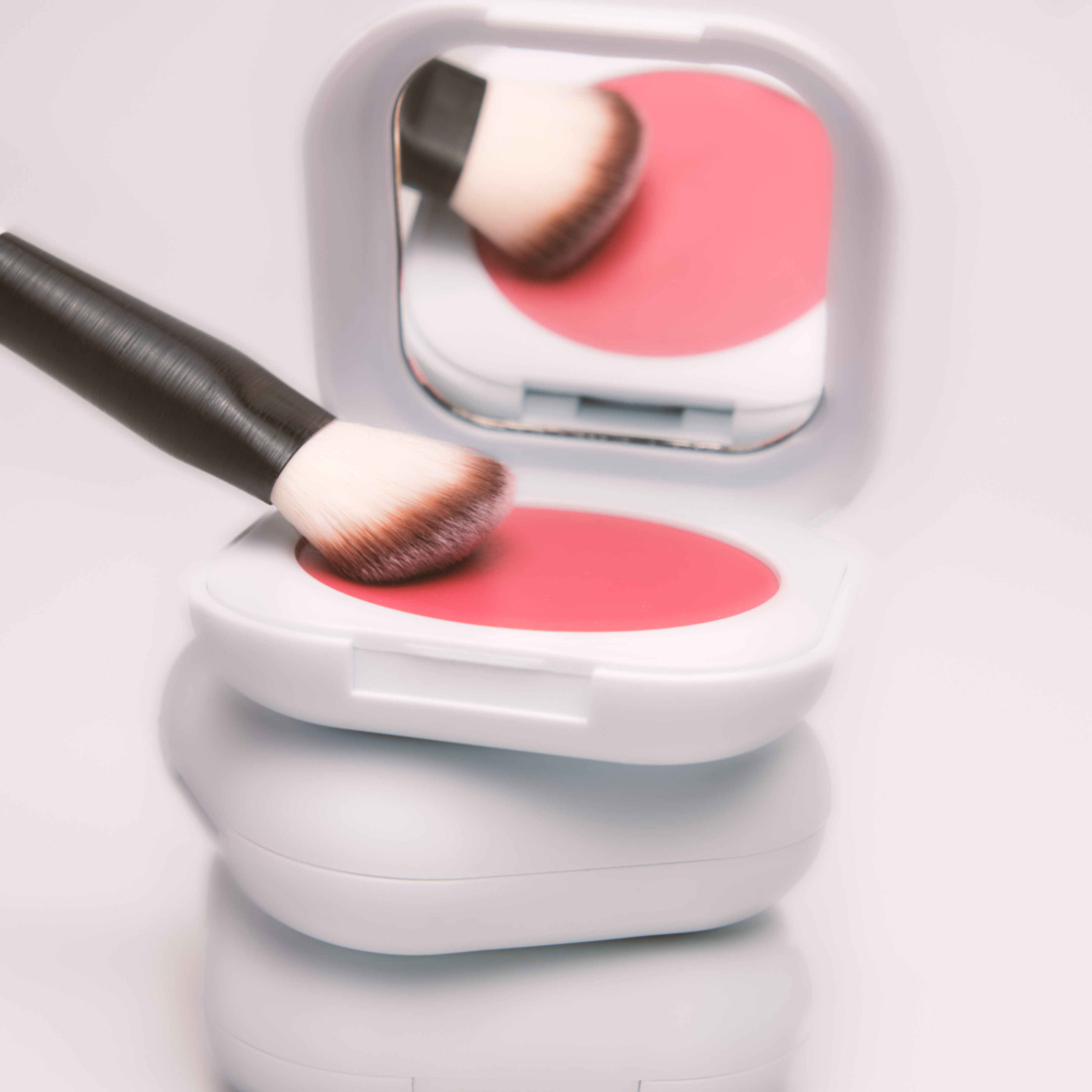 Close-up beauty image of the SOPHIA MAE Cream Blush and Liquid Blending Brush designed for seamless application.
