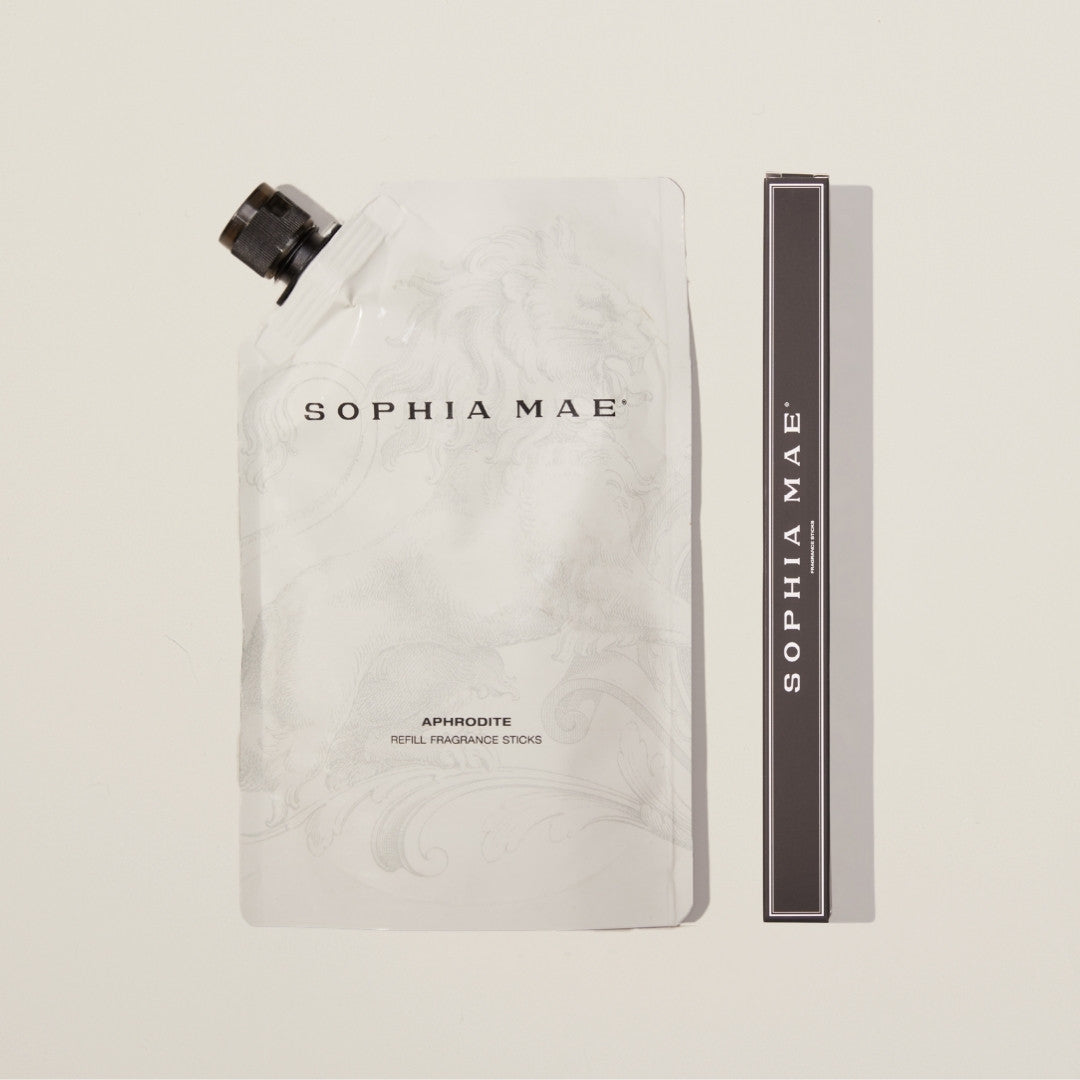 Aphrodite reed diffuser refill & fragrance sticks with floral notes, vanilla, amber, and musk.