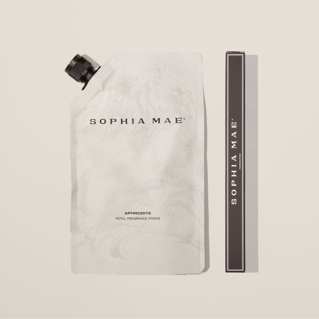 Aphrodite reed diffuser refill & fragrance sticks with floral notes, vanilla, amber, and musk.
