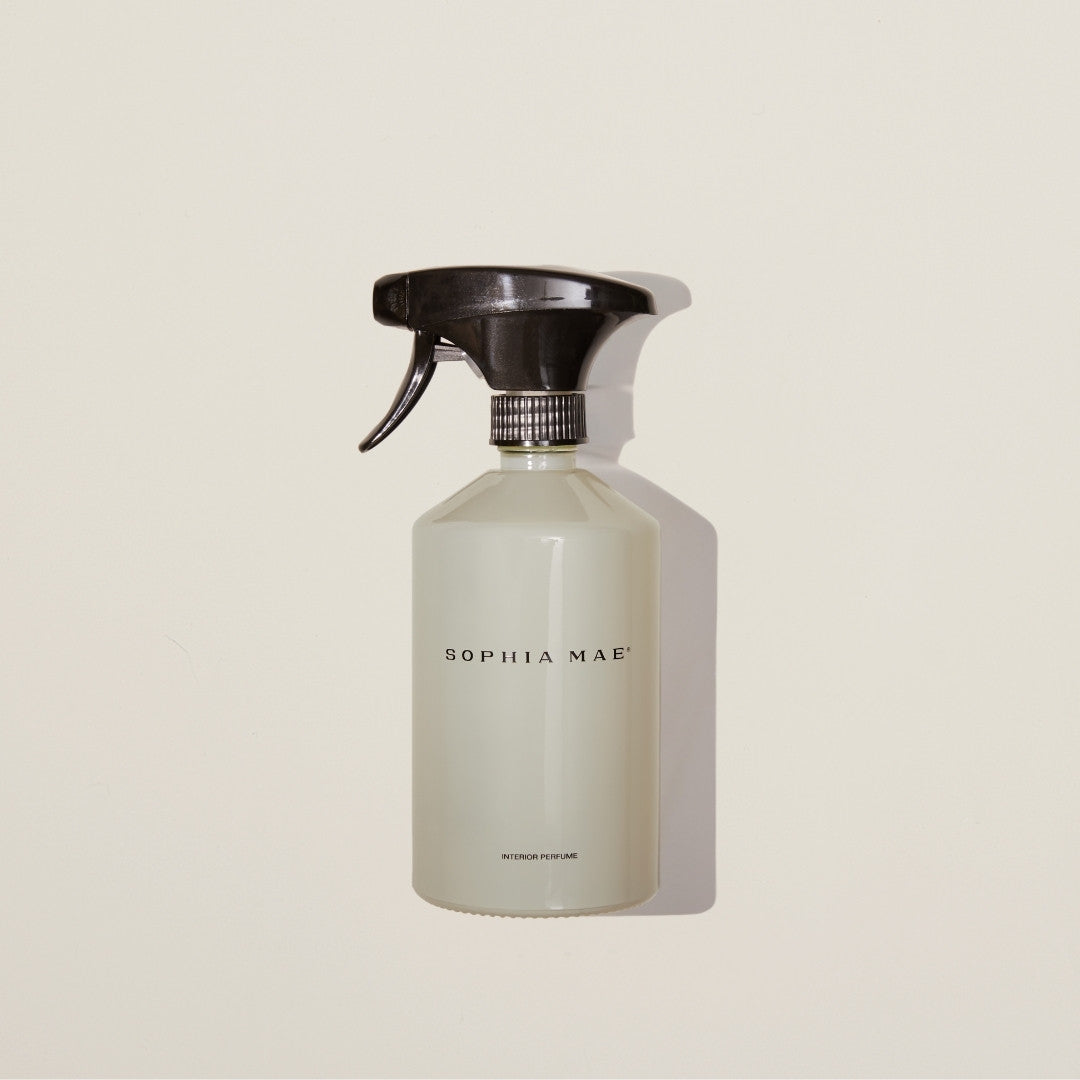 Aphrodite interior perfume spray in luxurious glass bottle – a warm, sensual blend of vanilla, amber, musk, and florals for a refined home ambiance.