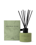 SOPHIA MAE Artemis fragrance diffuser with black reeds, presented beside it's packaging.