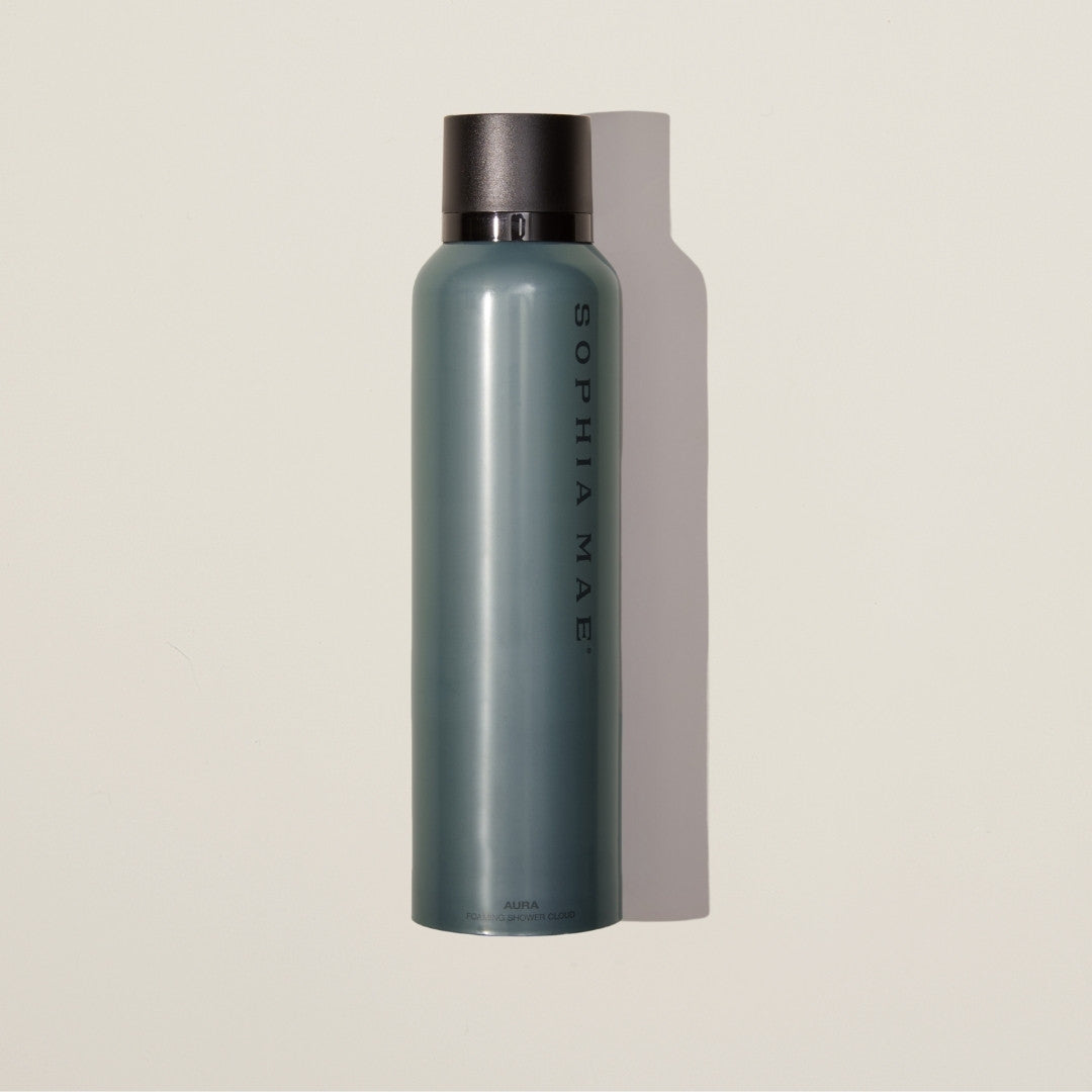 Matte bottle Aura shower foam – rich, velvety lather with a soft floral-spicy scent that revitalizes your aura with every use.