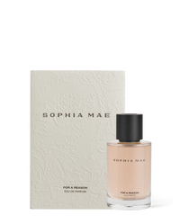 SOPHIA MAE For A Reason Eau de Parfum, formerly known as Aura, shown with its textured ivory packaging and clear glass perfume bottle.