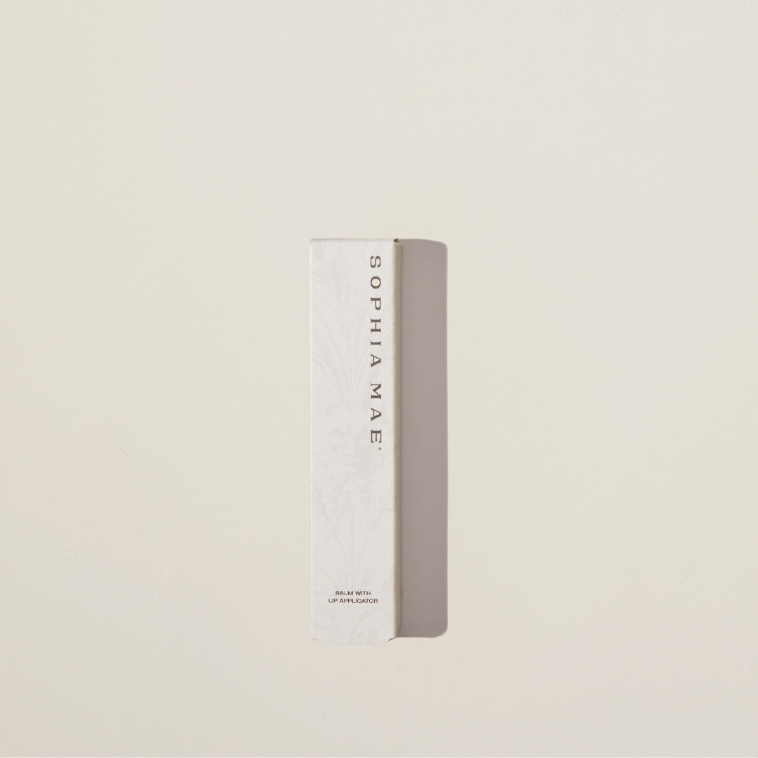 Moisturizing mini lip balm in stylish packaging – easy-to-use applicator delivers intensive care for dry lips with a subtle floral-vanilla scent.