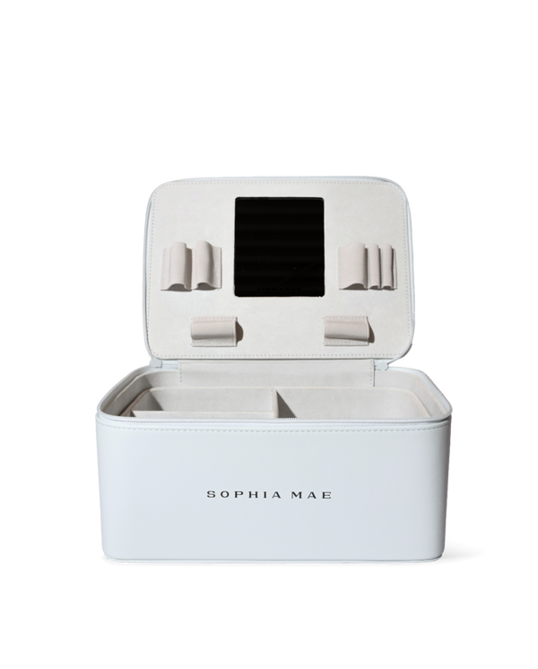 Open SOPHIA MAE beauty organizer with organized compartments and built-in mirror.