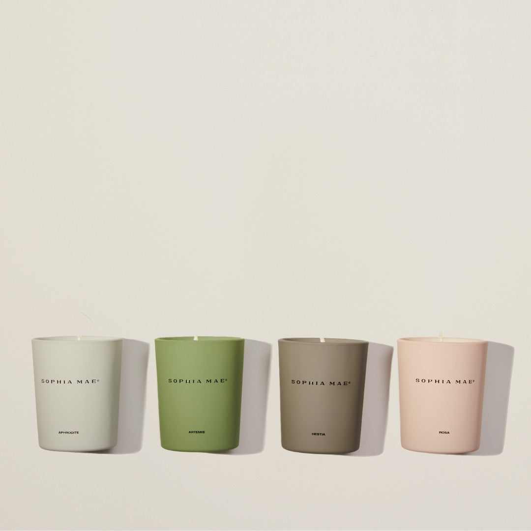 Luxury candle discovery set with four mini scented candles – explore floral, woody, and comforting aromas to match every mood and moment.