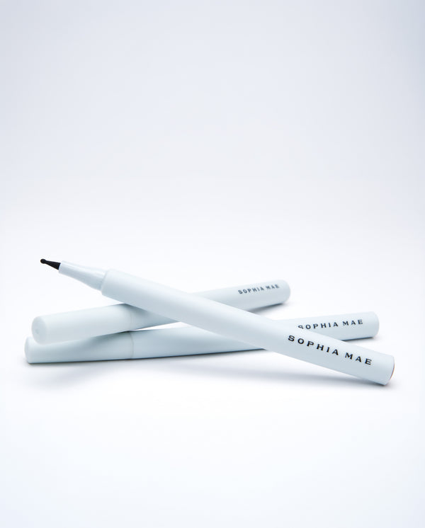 Three SOPHIA MAE Freckle Pens with white casing and black branding stacked on a clean white background.