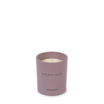 Luxury scented candle for relaxation with the fragrance of fig, amber, coconut and pine