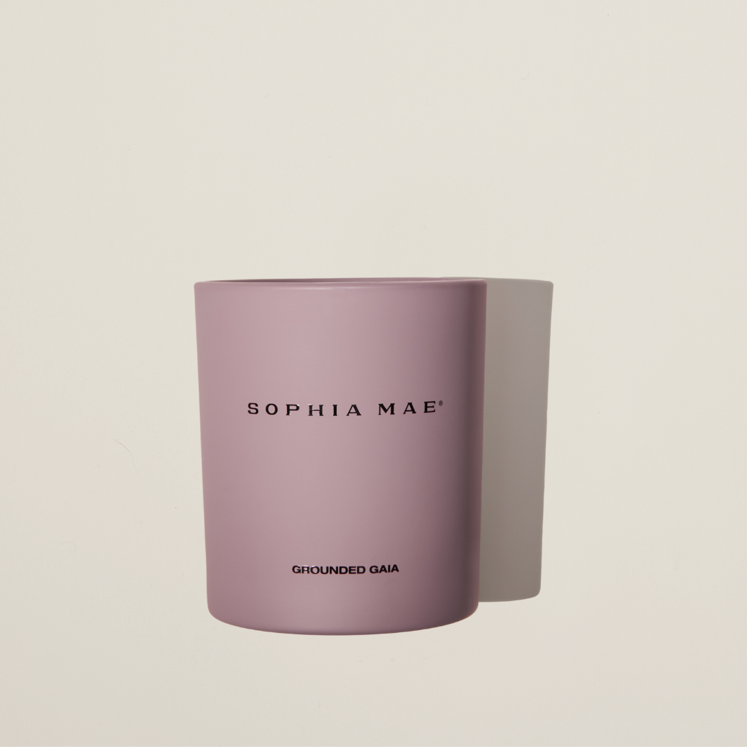 Grounded Gaia scented candle in soft purple design – soothing fig and warm earthy notes for a peaceful, mindful atmosphere.