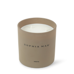 SOPHIA MAE Hestia two-wick candle in a soft beige glass vessel.