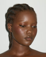 Close-up of the precision tip of SOPHIA MAE Liquid Eyeliner in Pitch Black.