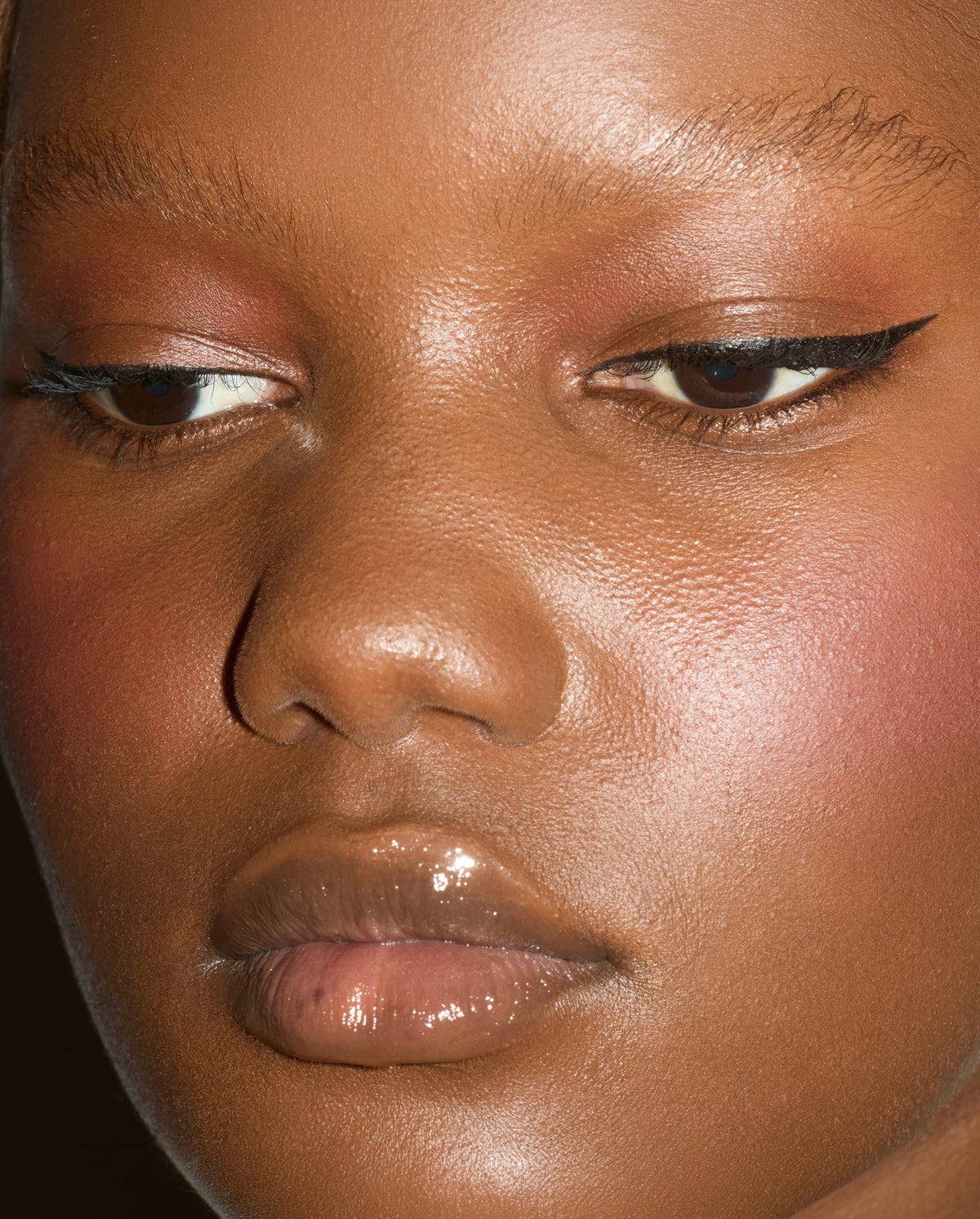 Close-up of model wearing SOPHIA MAE Liquid Eyeliner in Pitch Black.