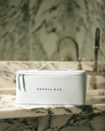 SOPHIA MAE Beauty Organizer closed on a marble bathroom counter.