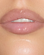 Close-up of softly defined pink lips wearing SOPHIA MAE Lip Liner with a glossy finish and natural-looking contour.