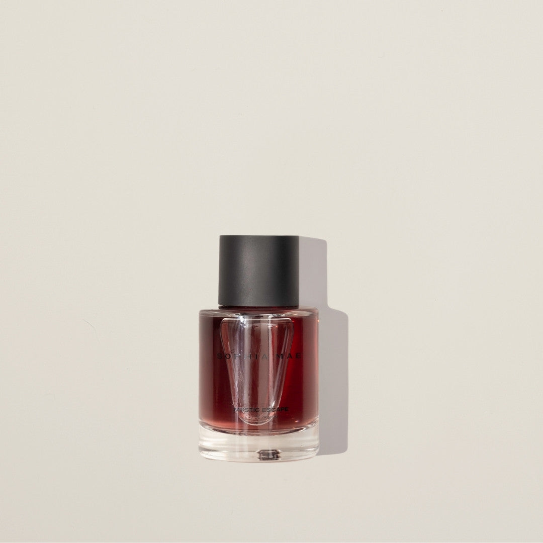 Mystic Escape eau de parfum – seductive night-time fragrance with raspberry, violet, rose, vanilla, and musk for a radiant, mysterious allure.