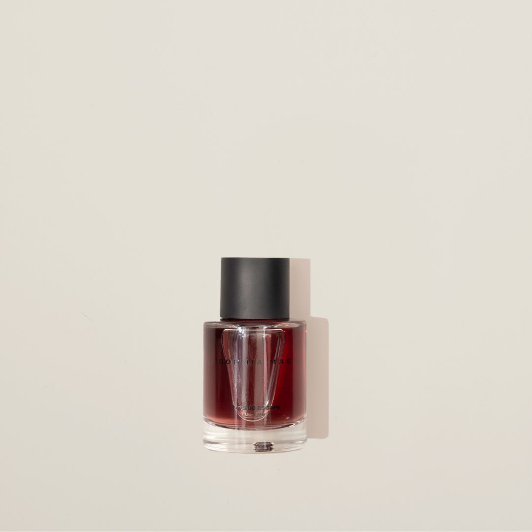 Mystic Escape eau de parfum – seductive night-time fragrance with raspberry, violet, rose, vanilla, and musk for a radiant, mysterious allure.