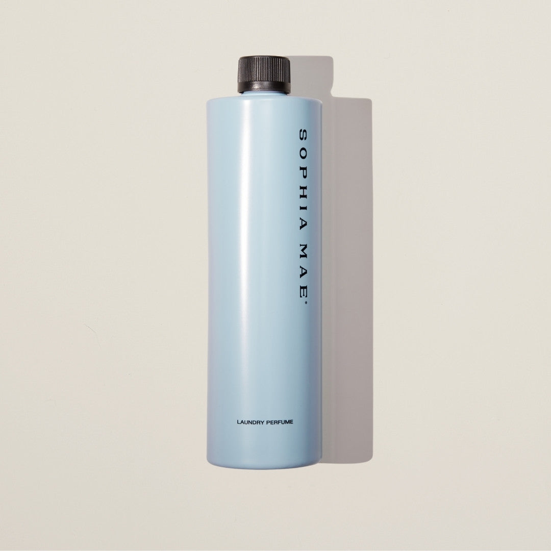 Midnight Melody laundry perfume – fresh and airy scent with citrus, coconut, vanilla, and musk for soft, elegantly scented laundry.
