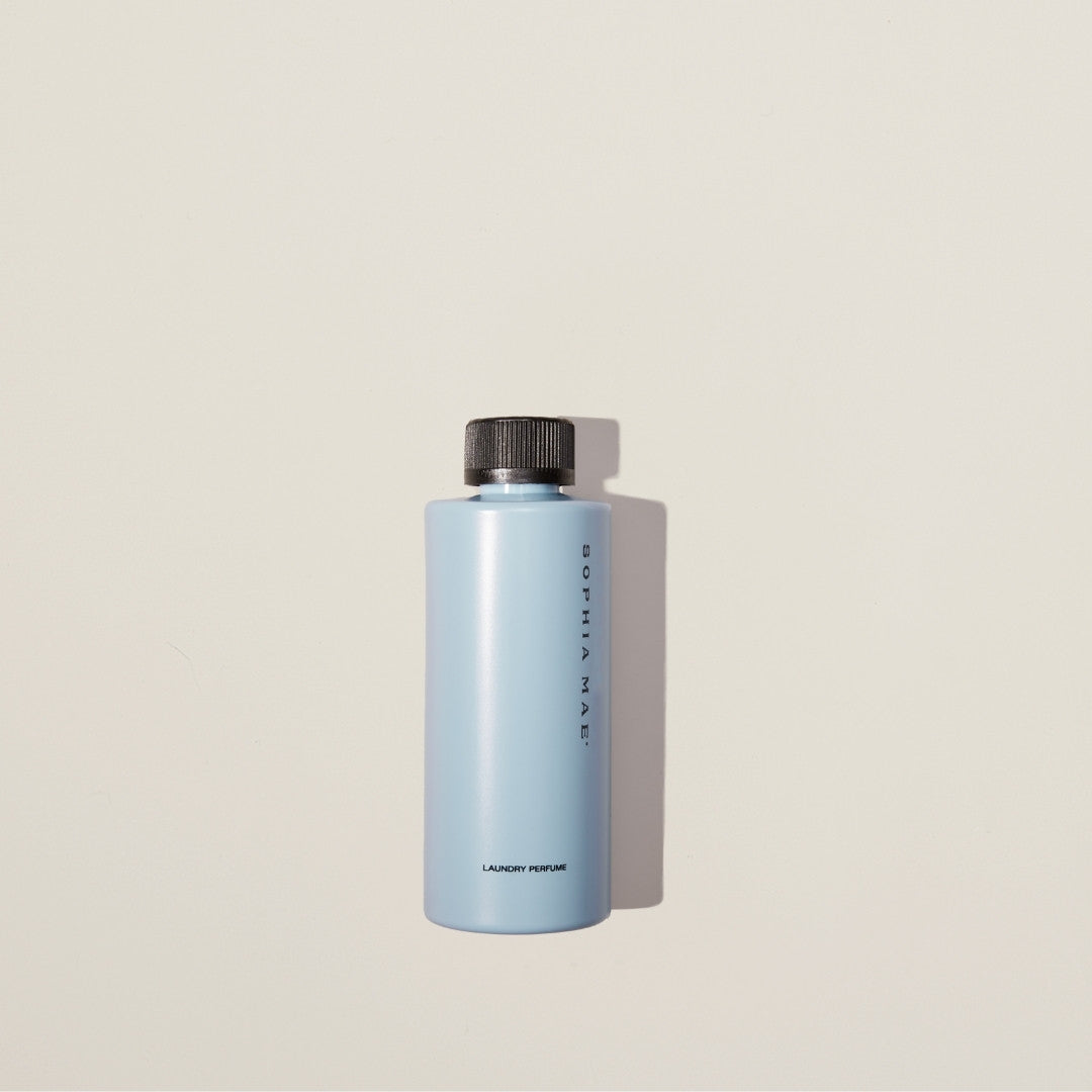 Luxury laundry perfume SOPHIA MAE – Midnight Melody infuses clothing and bedding with a long-lasting, calming floral-musky fragrance.