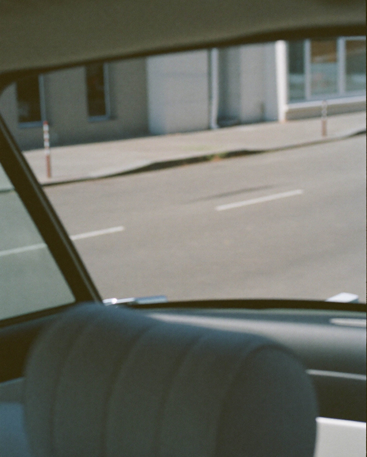Sunlit car interior inspired by SOPHIA MAE Modern Myth Eau de Parfum.