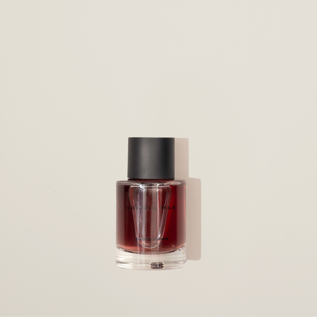 Mystic Escape eau de parfum – seductive night-time fragrance with raspberry, violet, rose, vanilla, and musk for a radiant, mysterious allure.