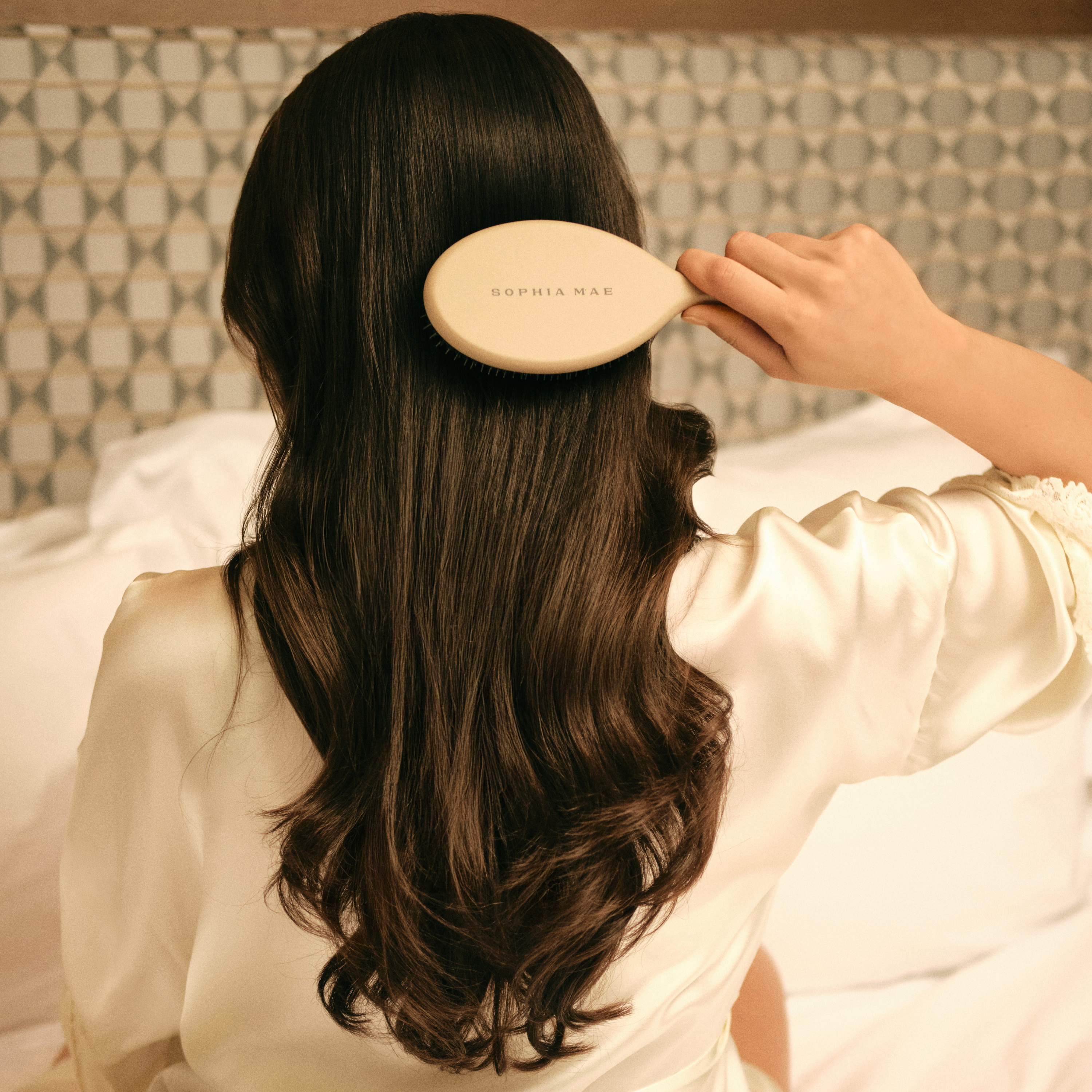 SOPHIA MAE boar bristle brush for natural shine and healthy hair, comes with a travel pouch.