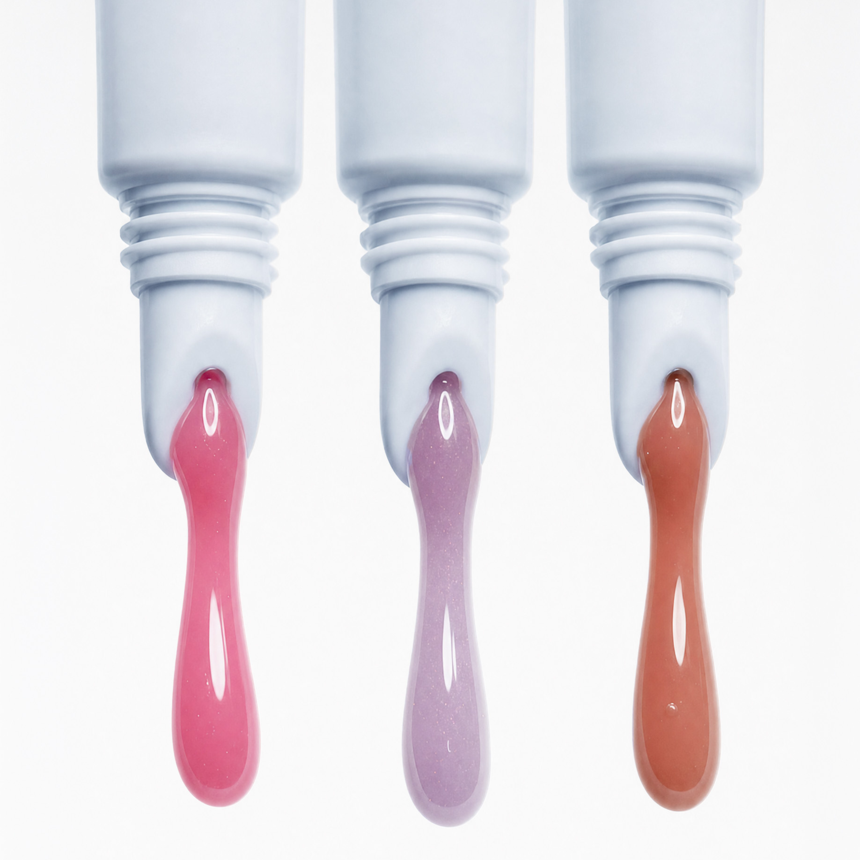 Three SOPHIA MAE lip glaze shades.