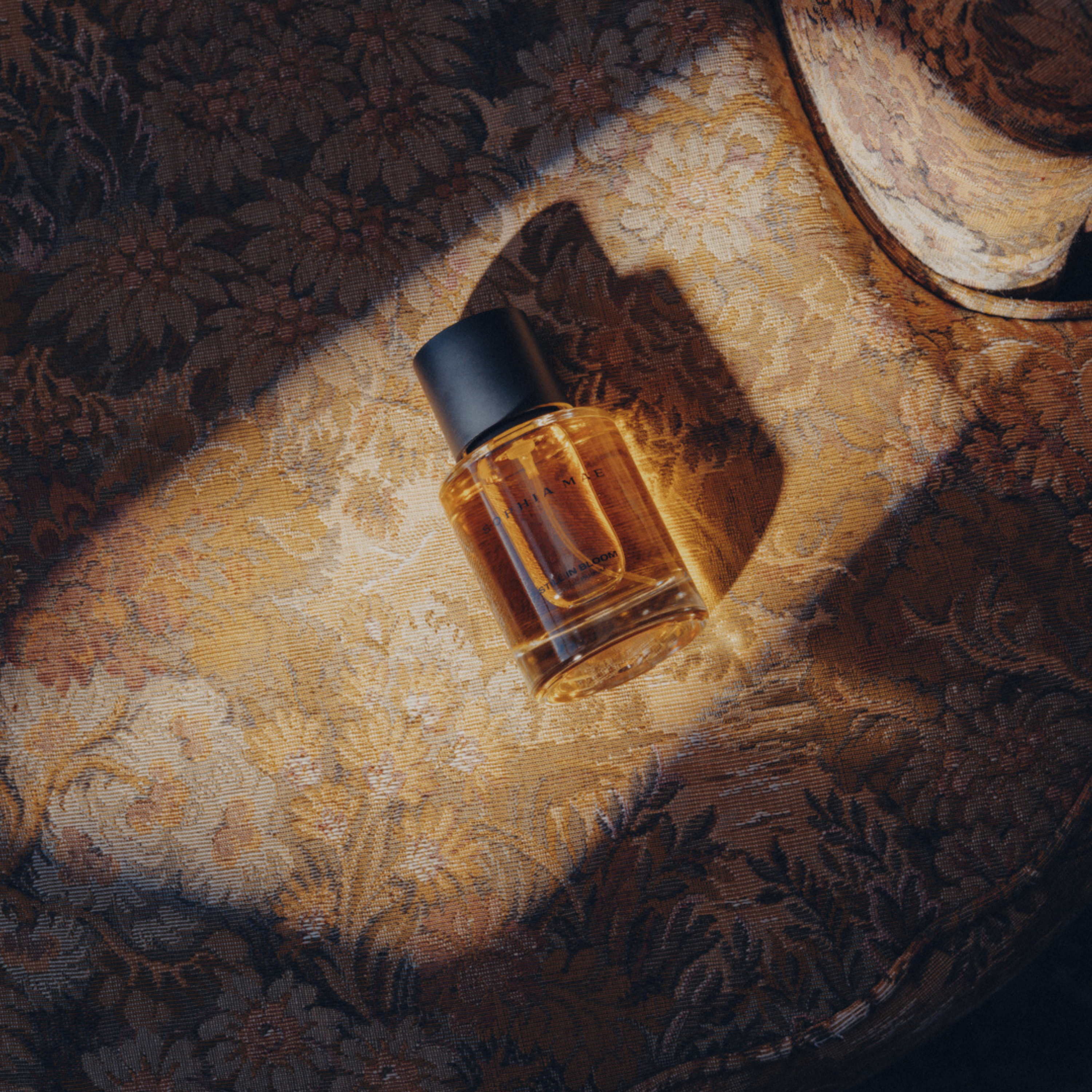 Light powdery perfume by SOPHIA MAE.