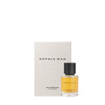 SOPHIA MAE Soft Summer Kiss eau de parfum with white embossed packaging and a perfume bottle filled with golden fragrance, finished with a black cap.