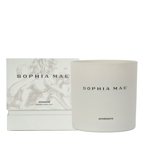 Packaging of and the Aphrodite scented candle with notes of vanilla, amber, and musk.