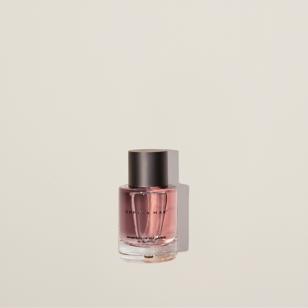 Whispers of Elegance eau de parfum – chic powdery fragrance with cedarwood, caramel, vanilla, and saffron for timeless sophistication.