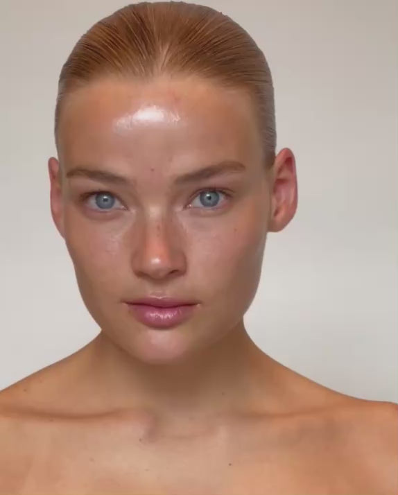 Model blending SOPHIA MAE Skin Tint into the skin with the Liquid Blending Brush for a fresh, even and skin-like finish.