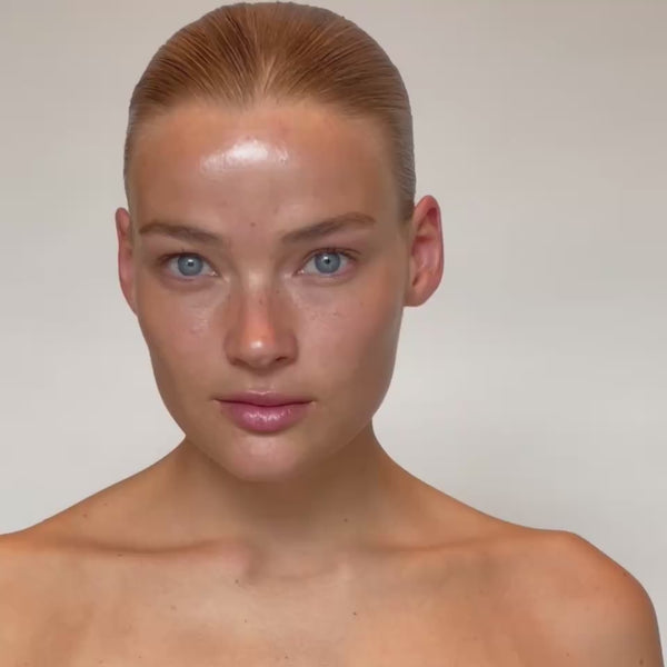 Model blending SOPHIA MAE Skin Tint into the skin with the Liquid Blending Brush for a fresh, even and skin-like finish.